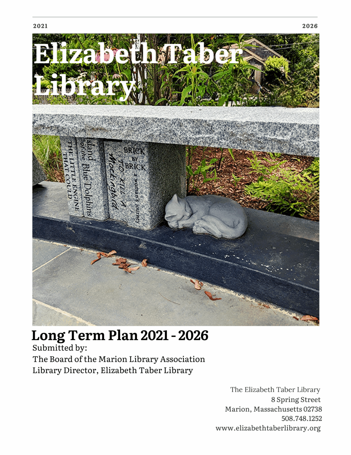 A stone cat statue rests on the ground beneath a granite bench inscribed with donor names in a garden outside the Elizabeth Taber Library. Text details the library’s long-term plan for 2021–2026.