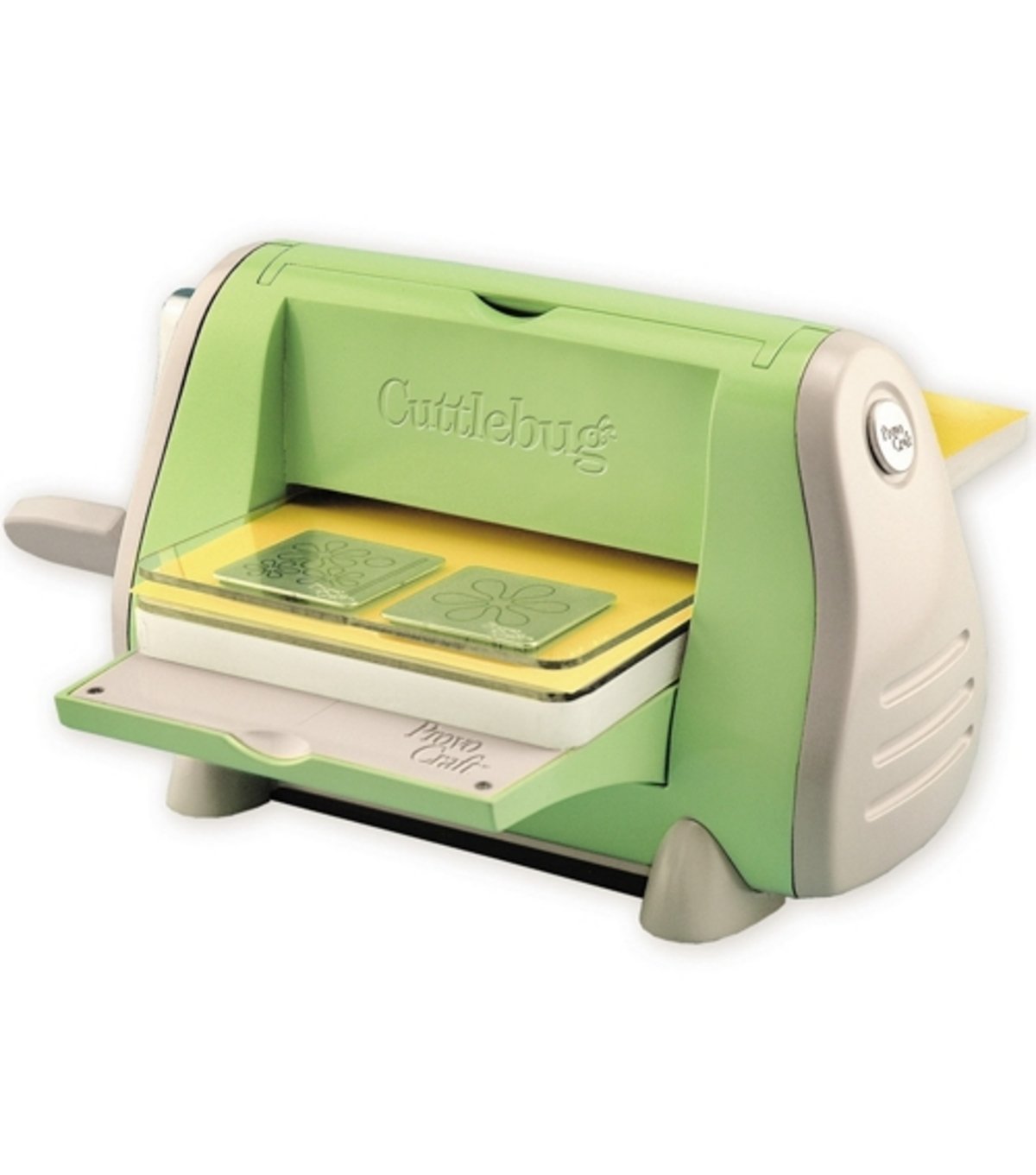 A green and white Cuttlebug die-cutting and embossing machine with a handle, shown with yellow plates and flower-shaped dies inside.