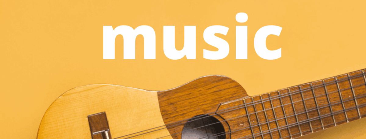 Yellow background with the word music in bold white text above the body and neck of an acoustic guitar.